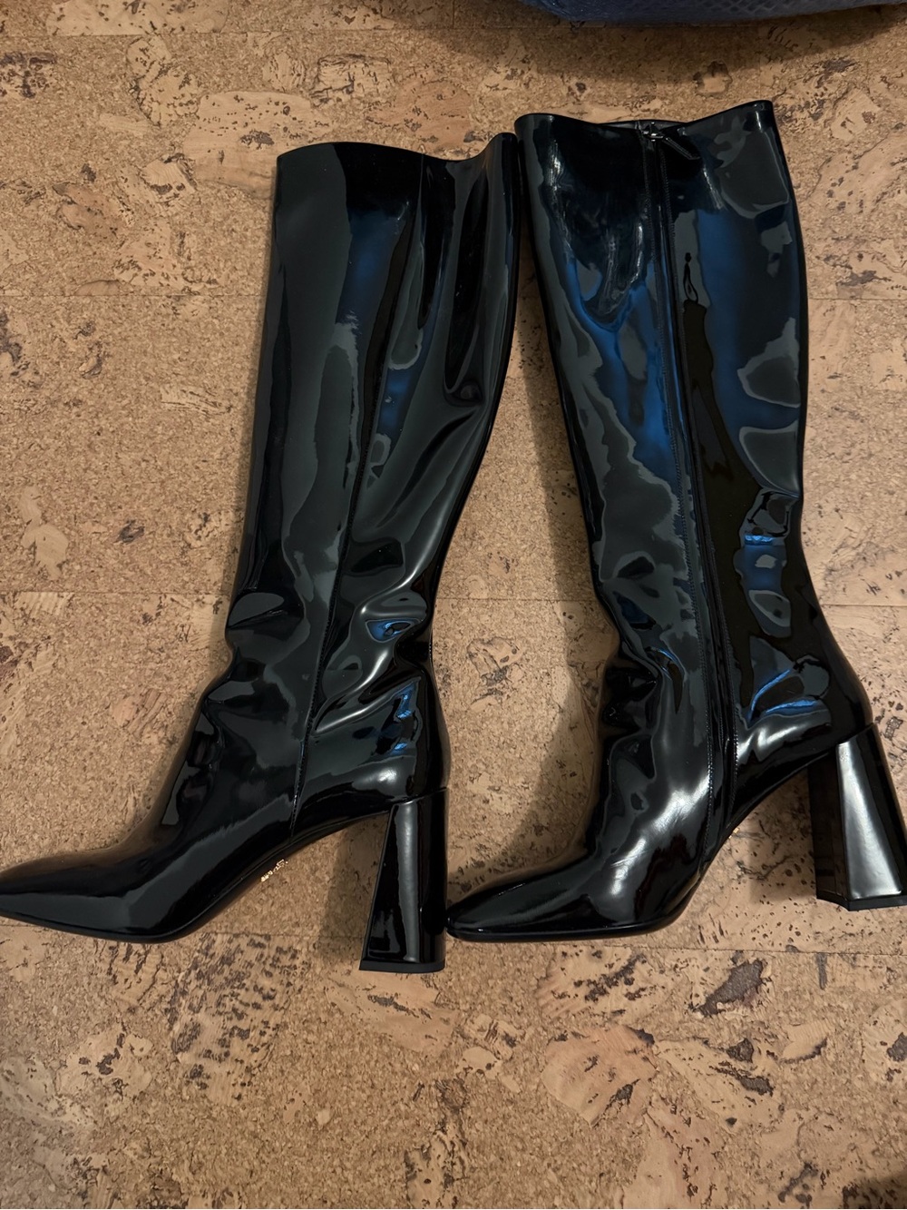 PRADA
Patent Leather Knee-High Boots